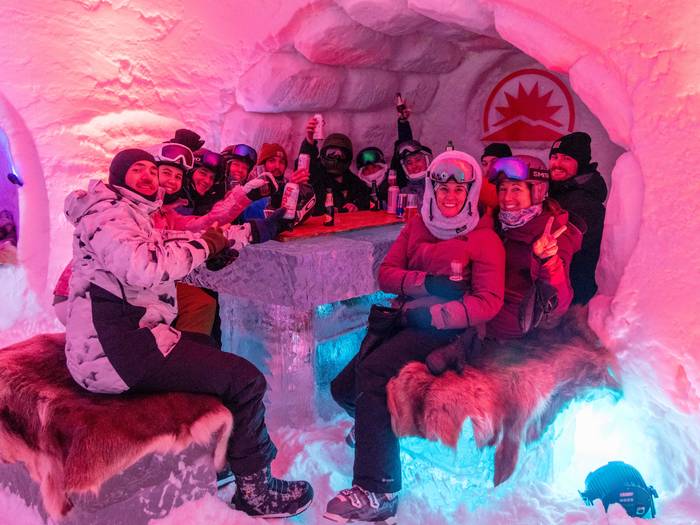People enjoying drinks at The Igloo at Sunday River.