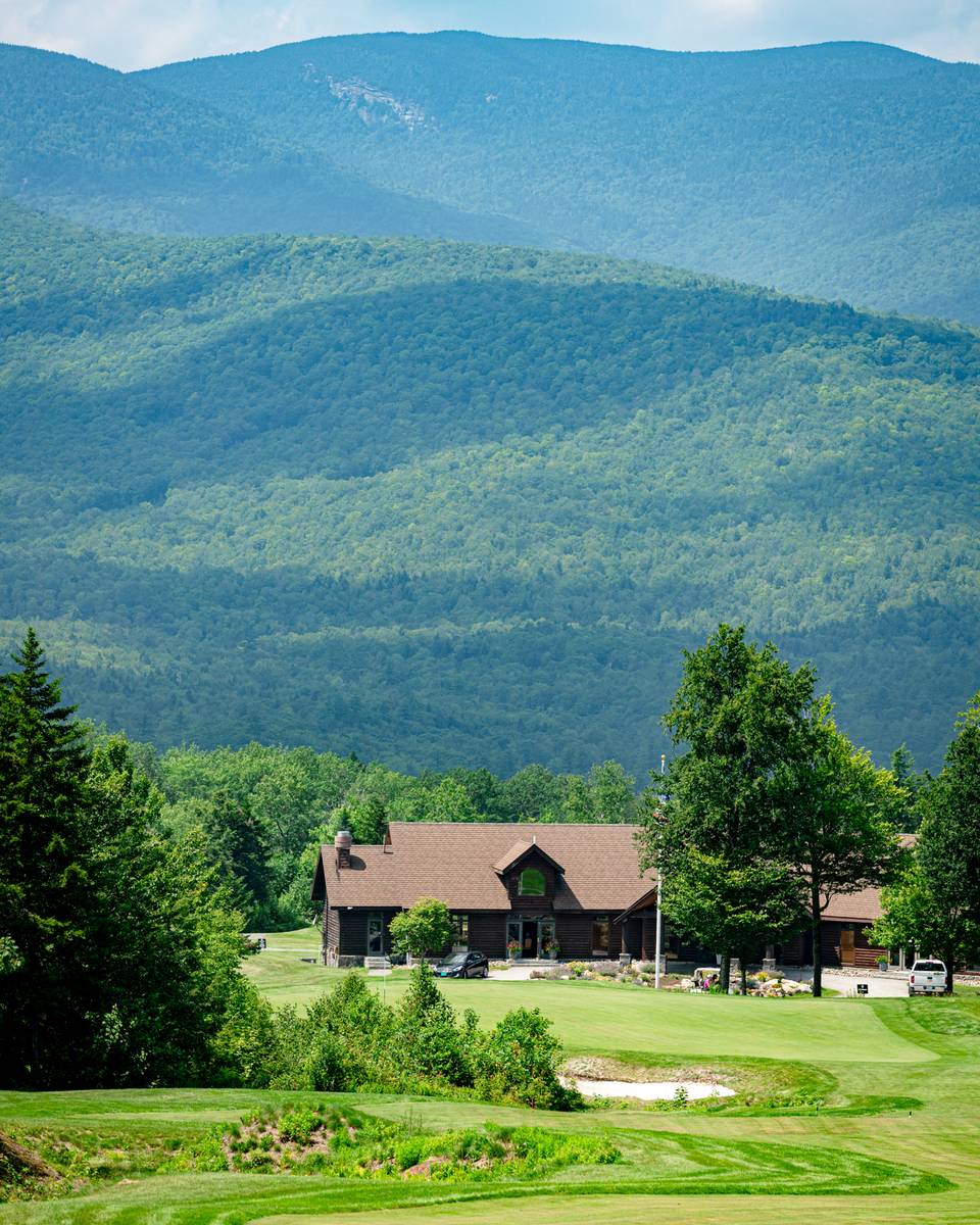 Views of The Clubhouse at Sunday River Golf Club in the summer.