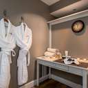 Bathrobes hanging in the spa services room at the Jordan Spa at Sunday River.