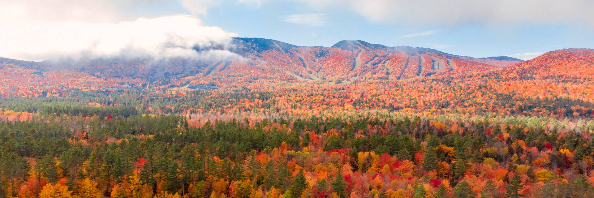 The Sunday River 8 peaks in peak fall foliage in the fall.