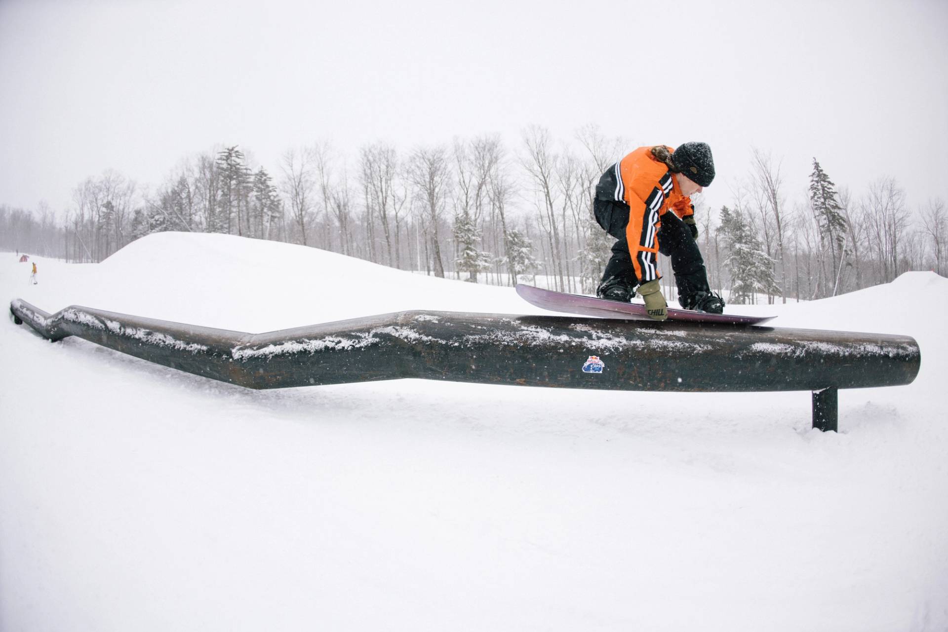 A snowboarder on a rail at Sunday River, ME