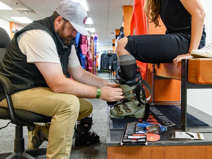Guest getting new boots fitted at Sunday River Sports.