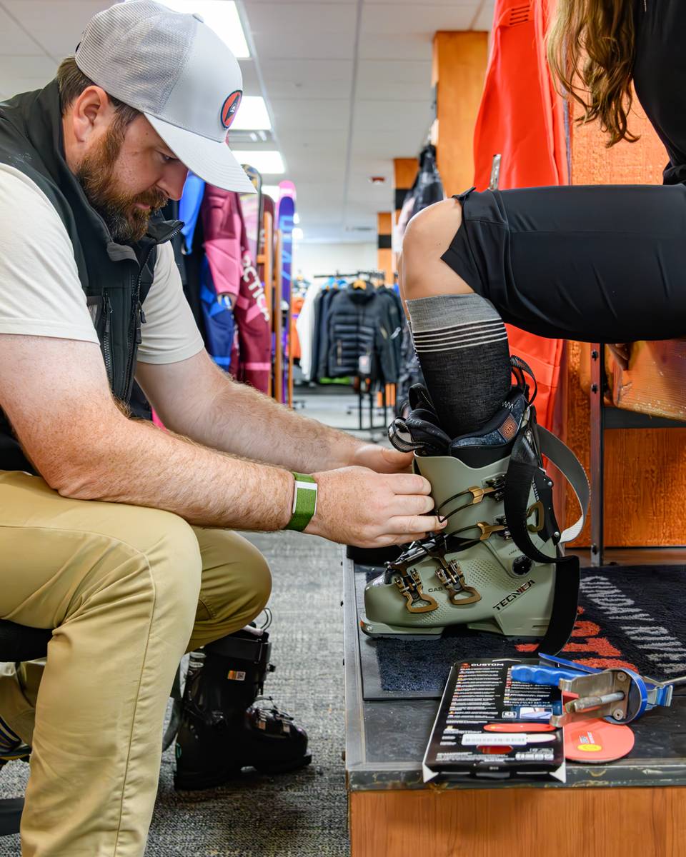 Guest getting new boots fitted at Sunday River Sports.