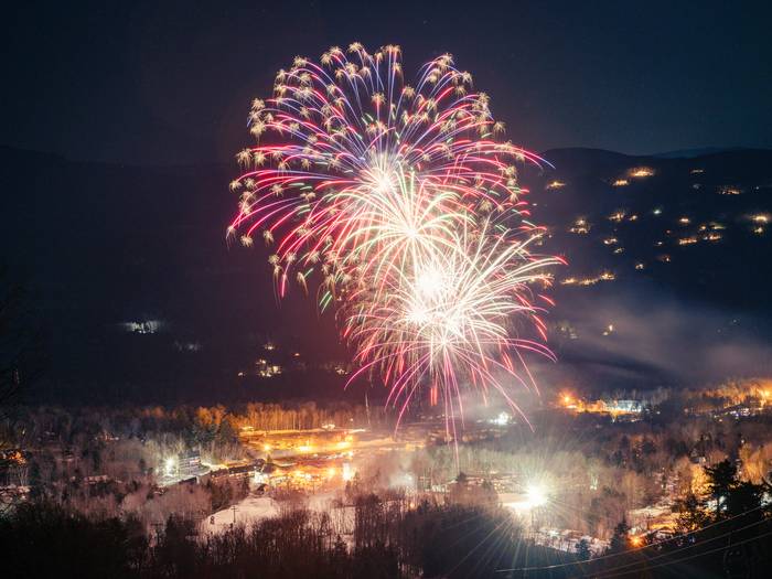 A large fireworks display in the winter at Sunday River.