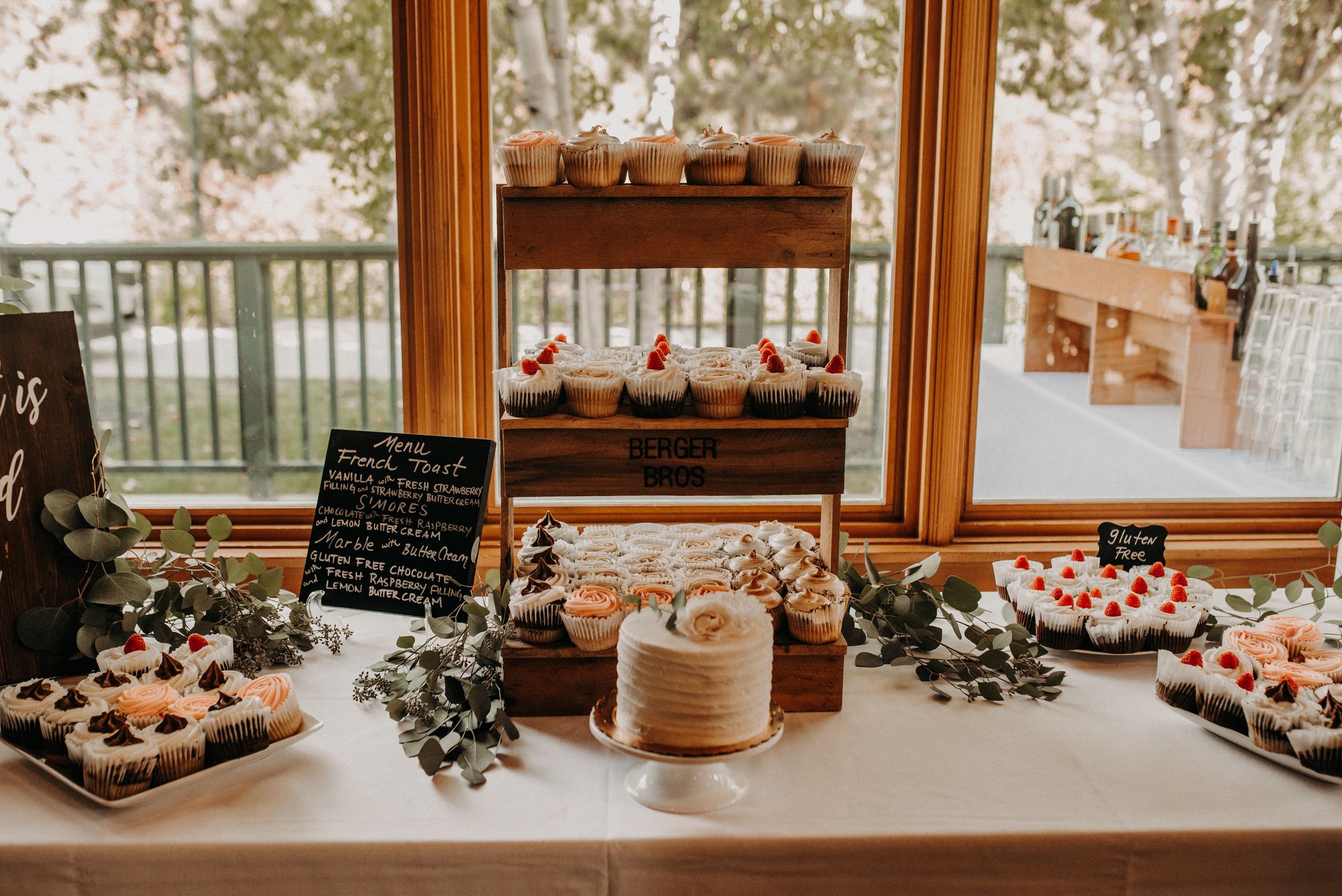 Lots of desserts on a table for a wedding.
