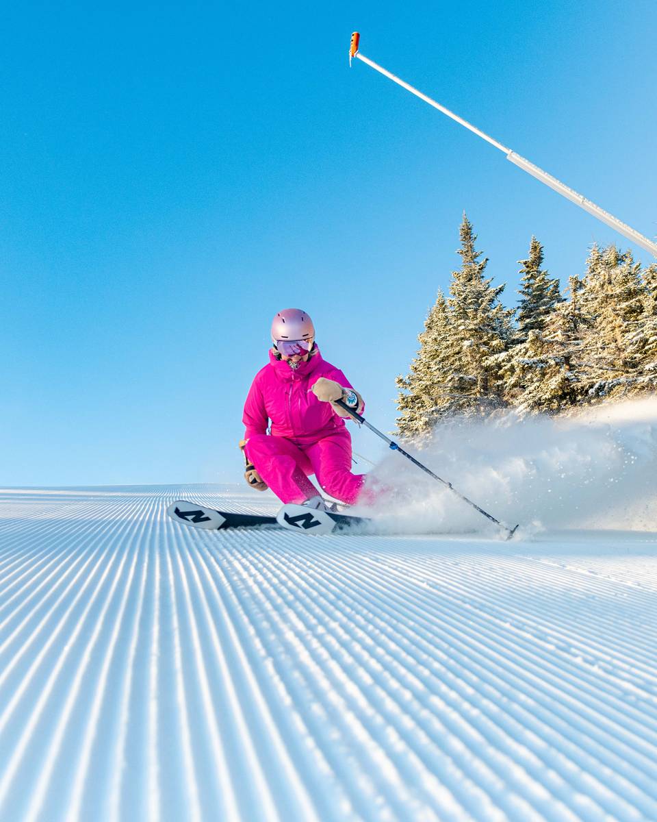 A woman skiing at Sunday River.