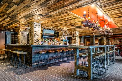 The rustic Camp bar and dining area at Sunday River.