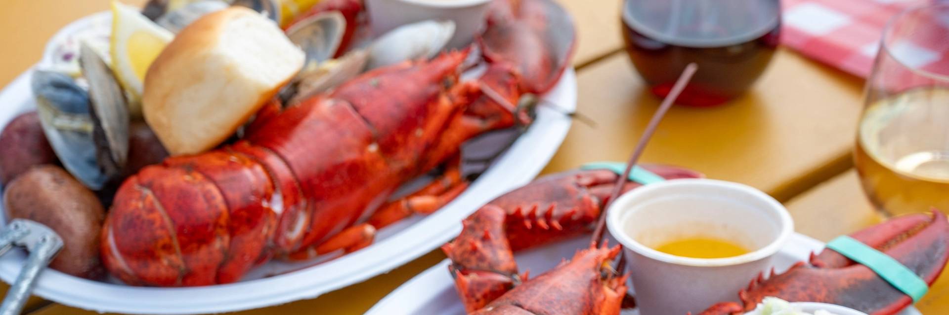 Lobsters on a platter with steamers and potatoes at Sunday River's lobster bake.