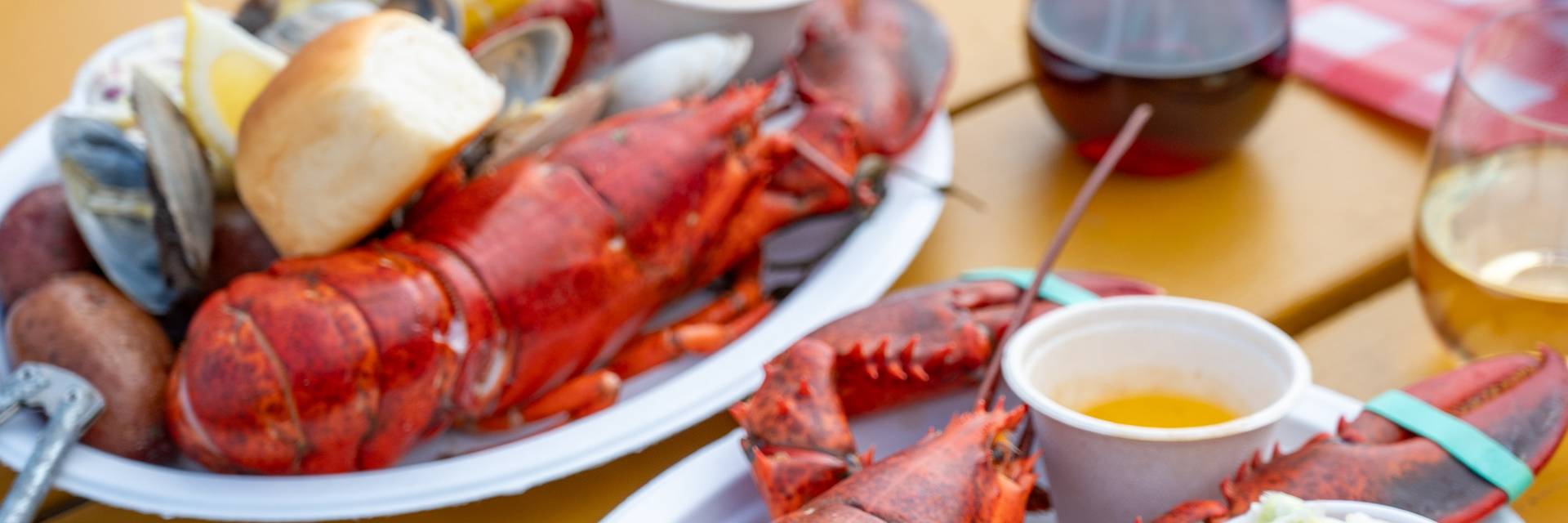 Lobsters on a platter with steamers and potatoes at Sunday River's lobster bake.