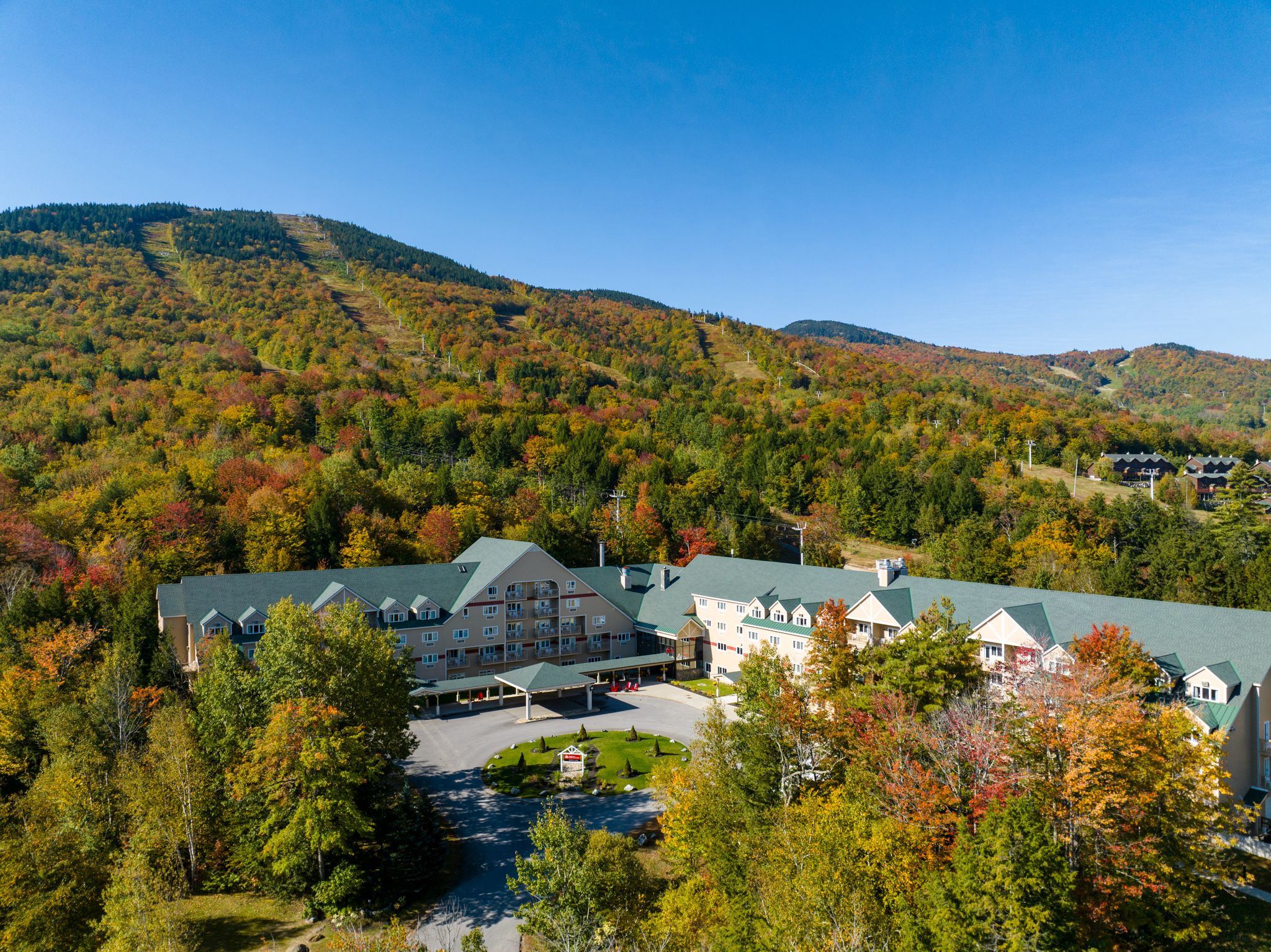 The entrance to the Grand Summit Hotel at Sunday River Resort in the fall.