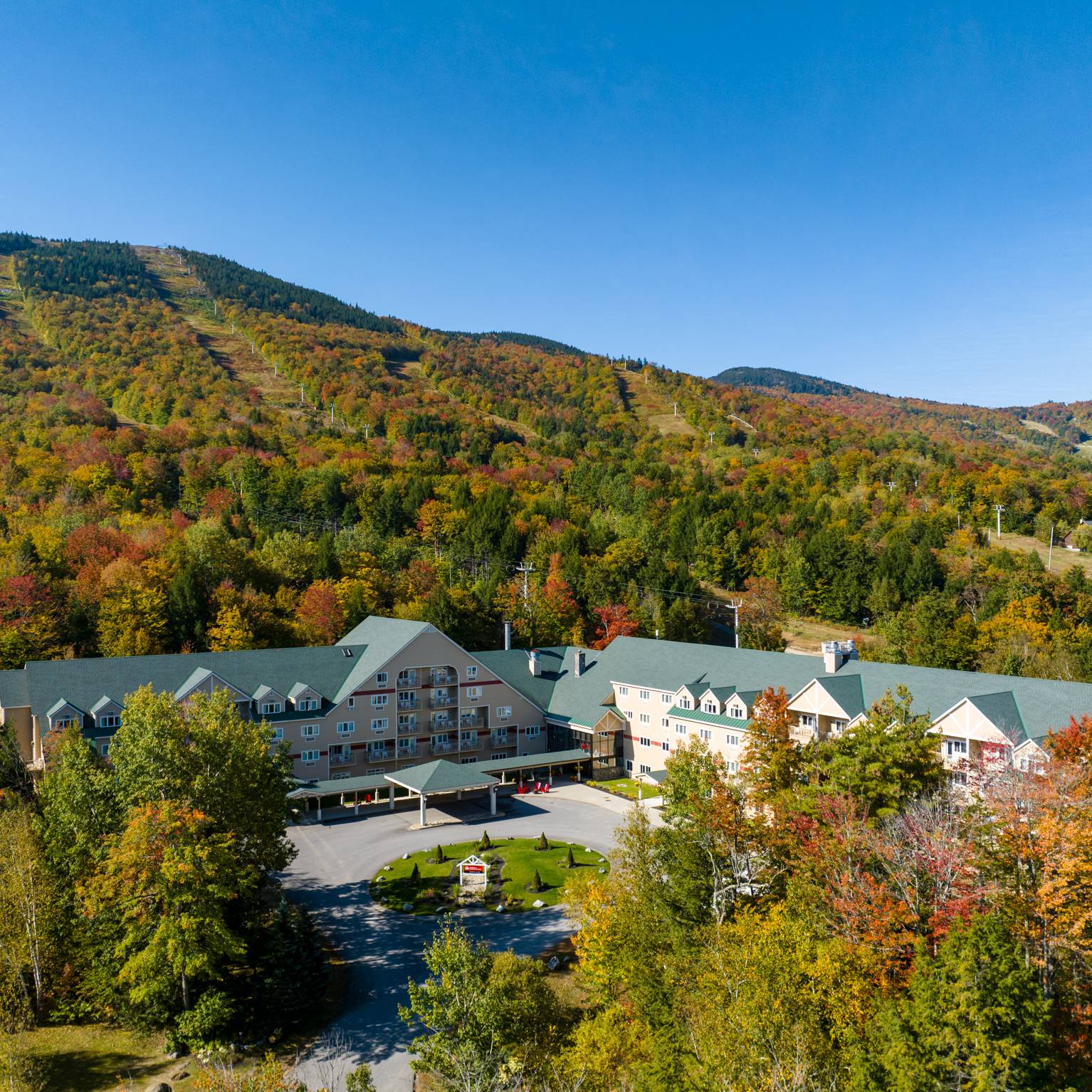 The entrance to the Grand Summit Hotel at Sunday River Resort in the fall.