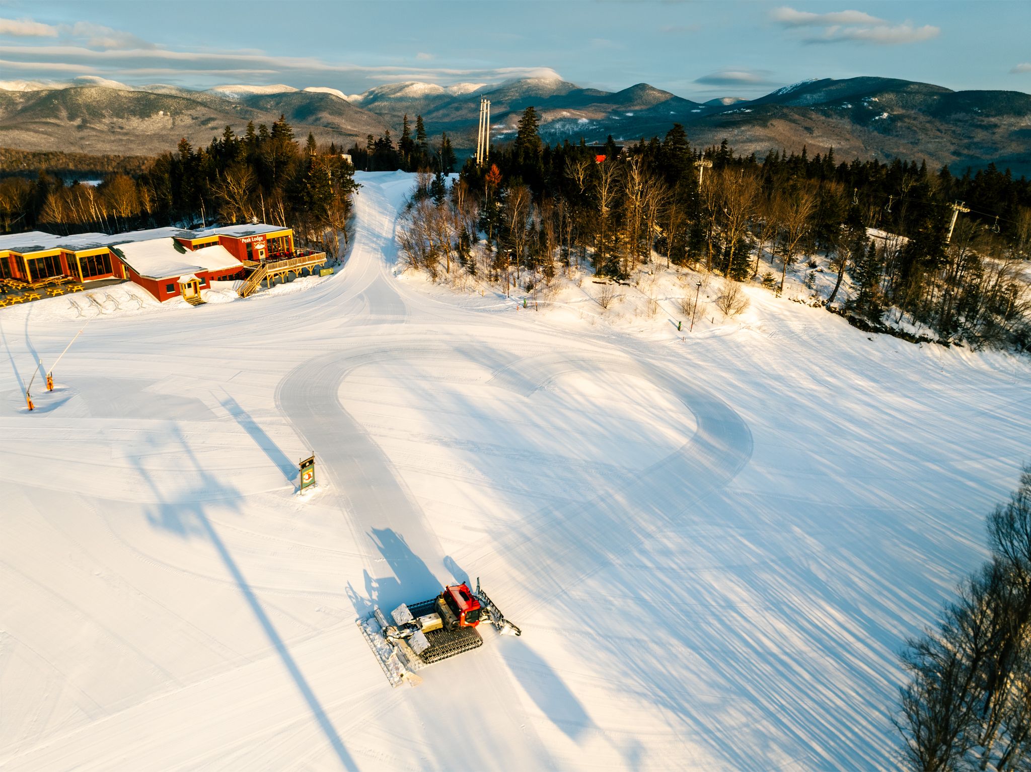 A groomer with a heart in the snow