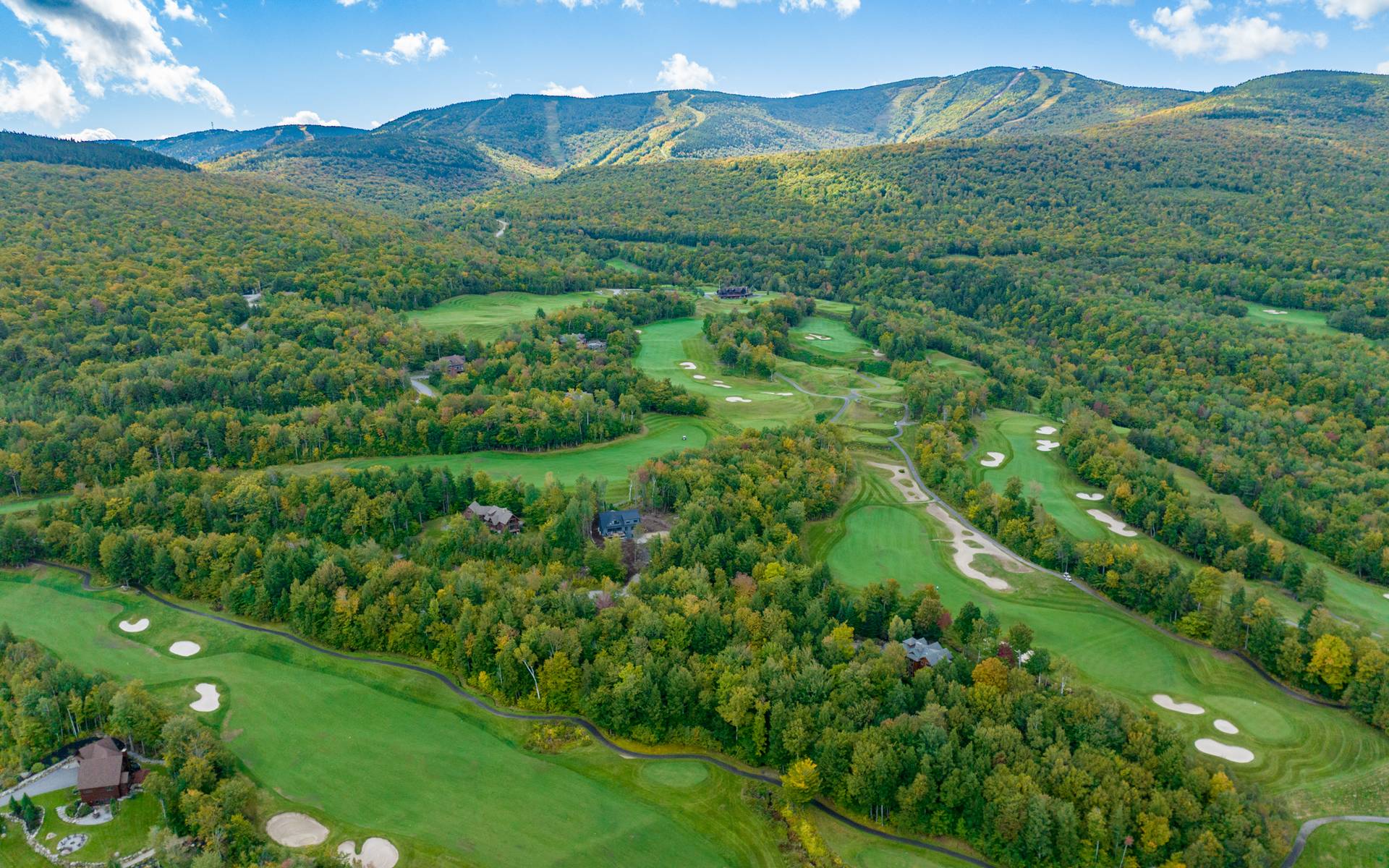 An overview of the Sunday River Golf Club in the height of Summer.