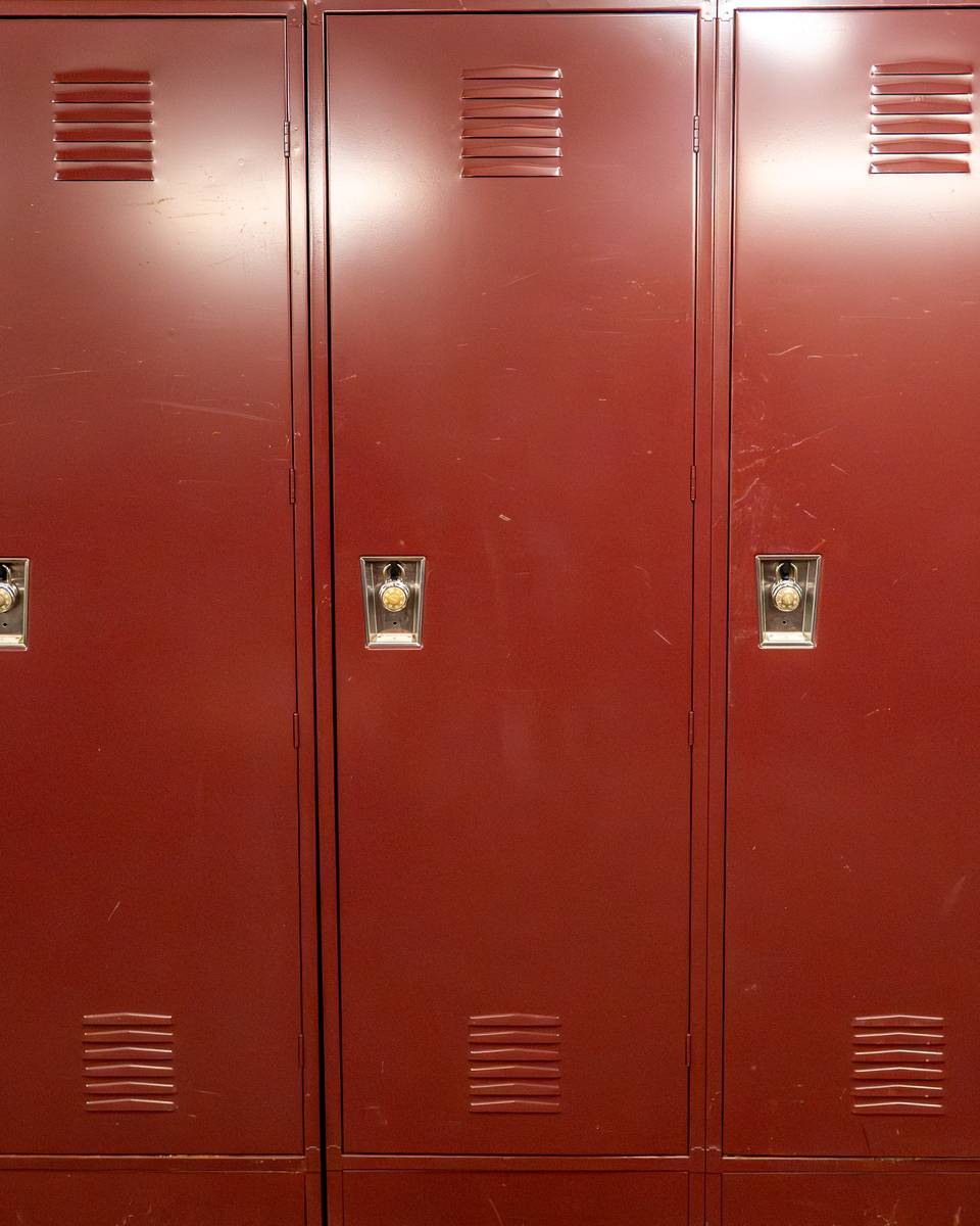 South Ridge Locker rooms with maroon lockers.