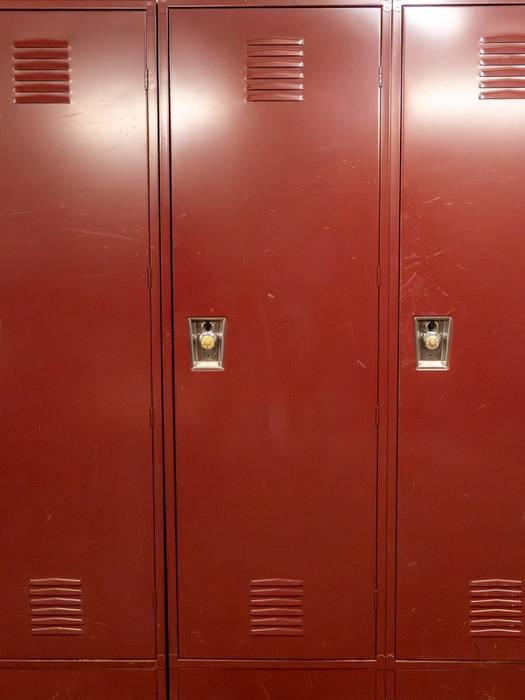 South Ridge Locker rooms with maroon lockers.