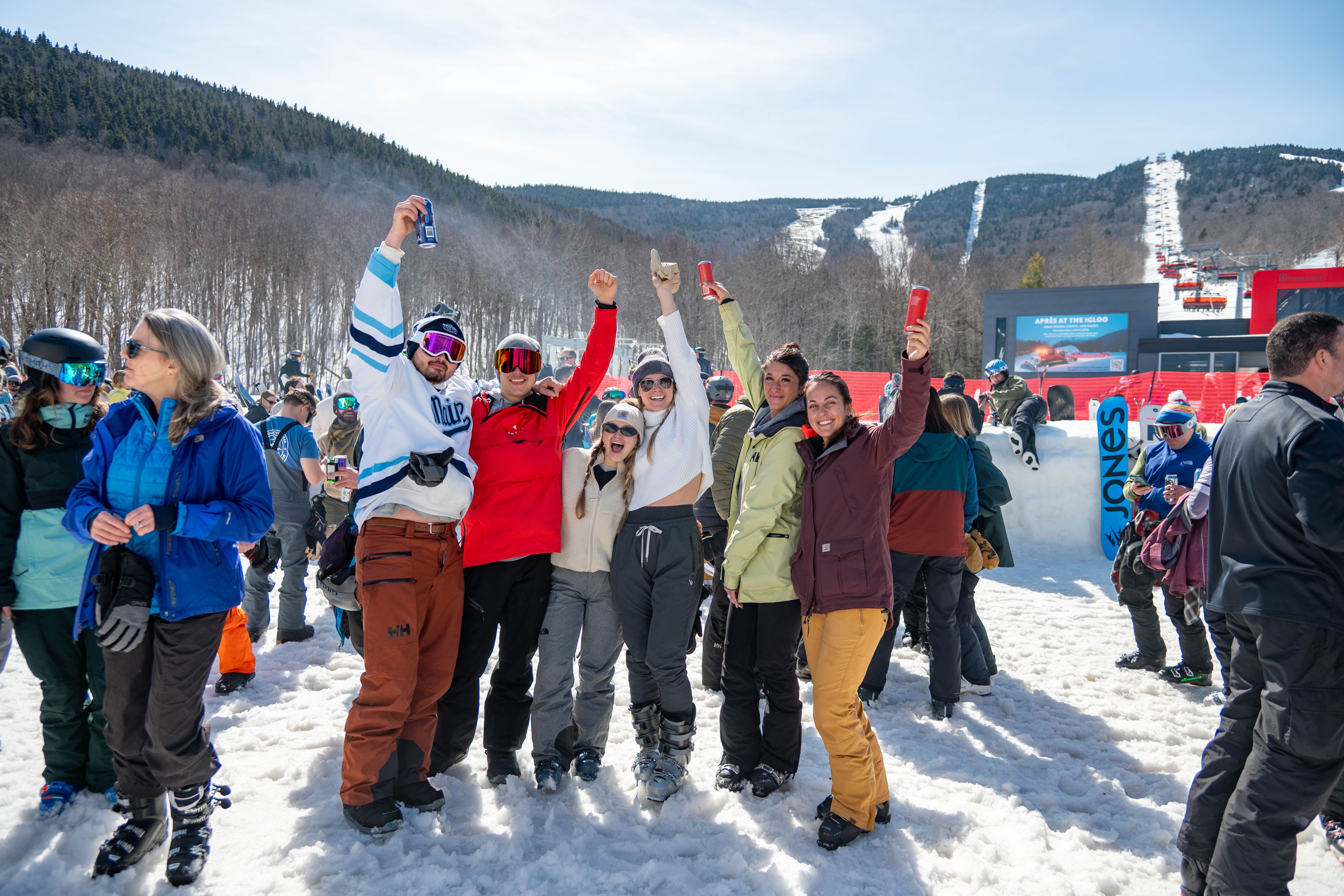 People posing for a picture at the Iglu.