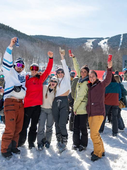 People posing for a picture at the Iglu.