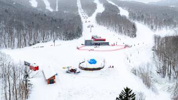 A snowmaker making snow at Sunday River.