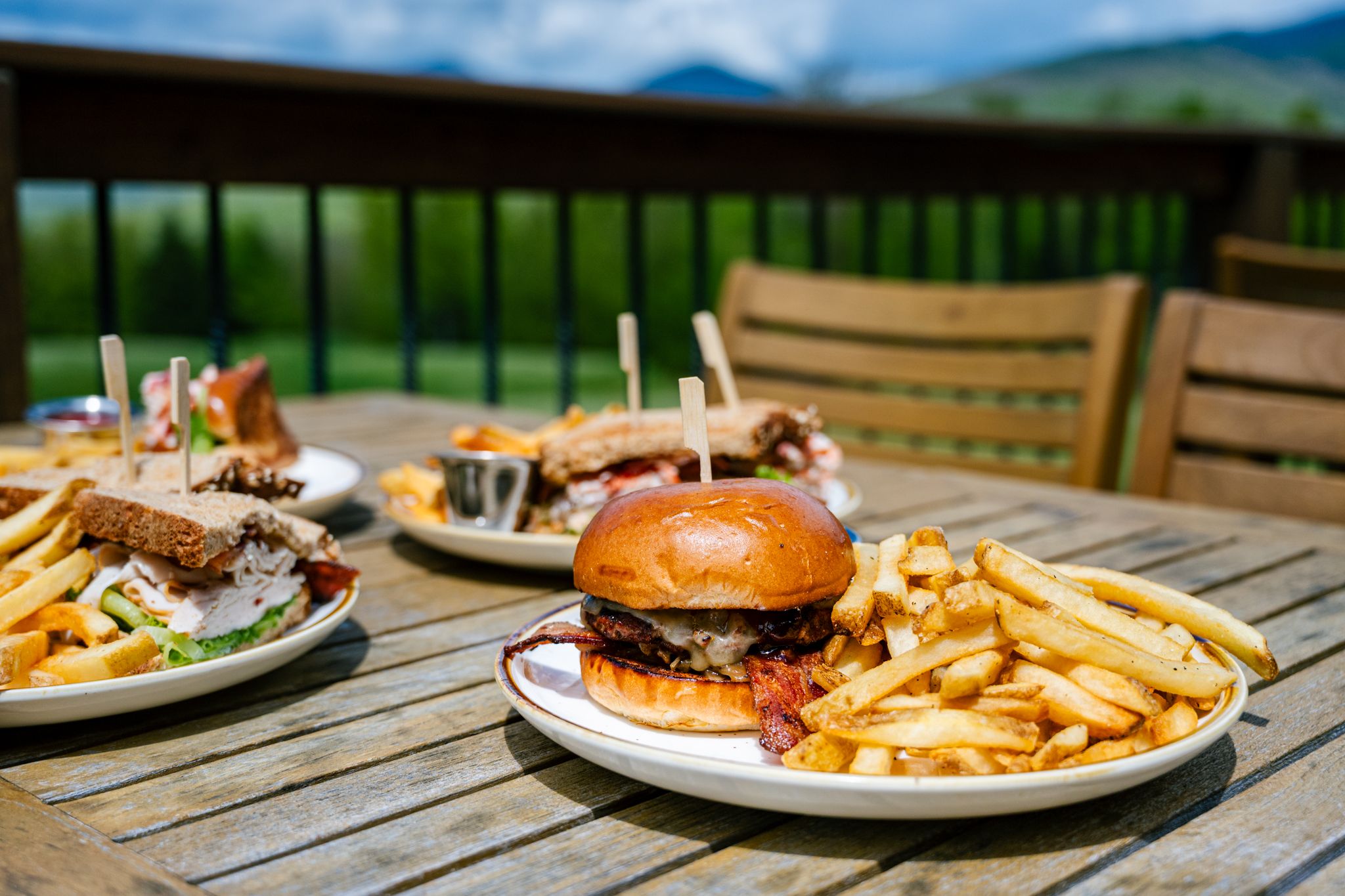 A plate of food on the outside table at The Clubhouse.
