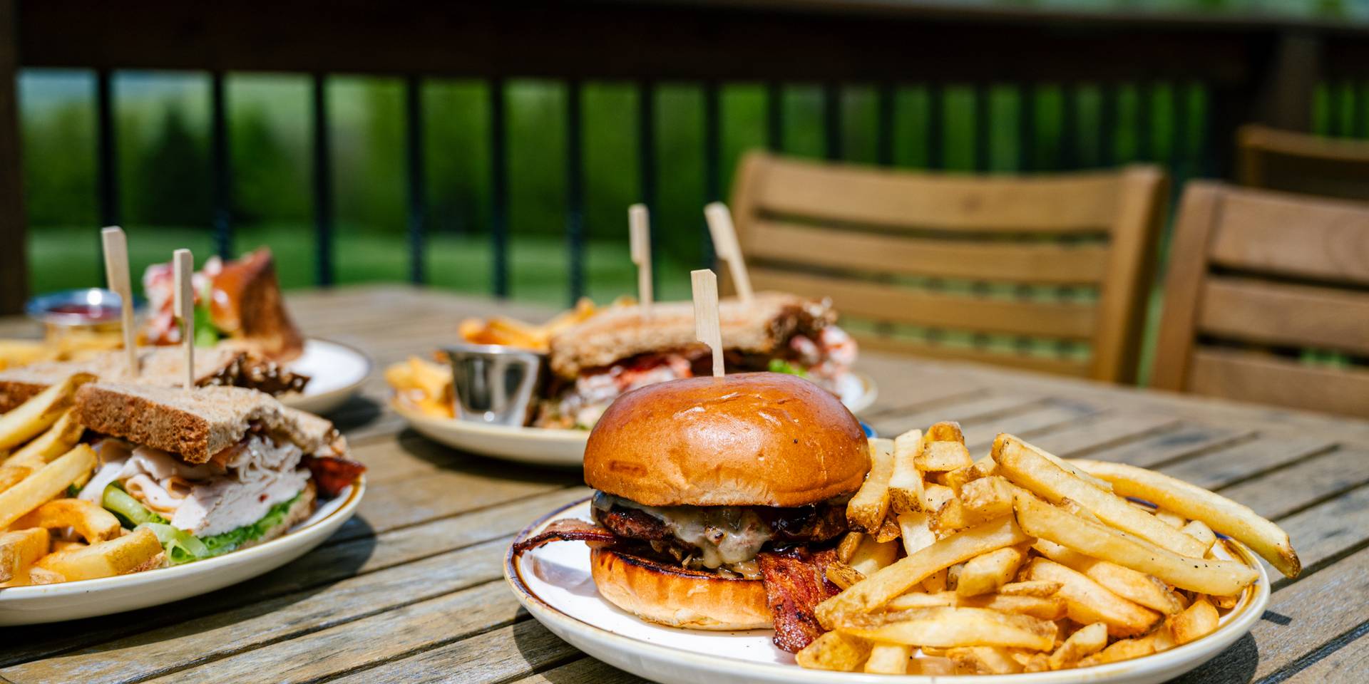 A plate of food on the outside table at The Clubhouse.