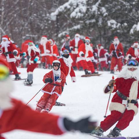 Santas skiing at Sunday River Resort during Santa Sunday
