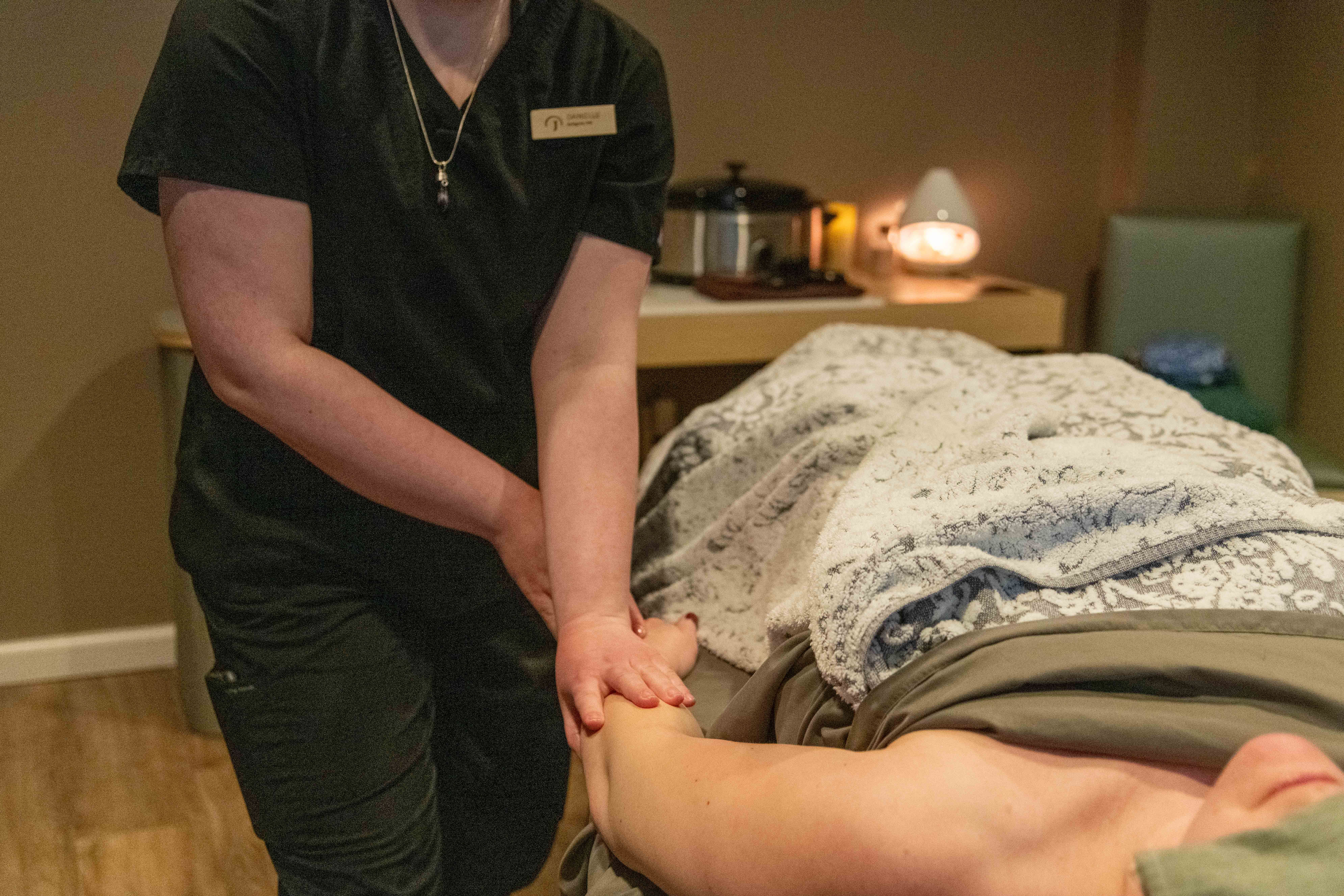 A woman getting a massage at the Jordan Spa at Sunday River.