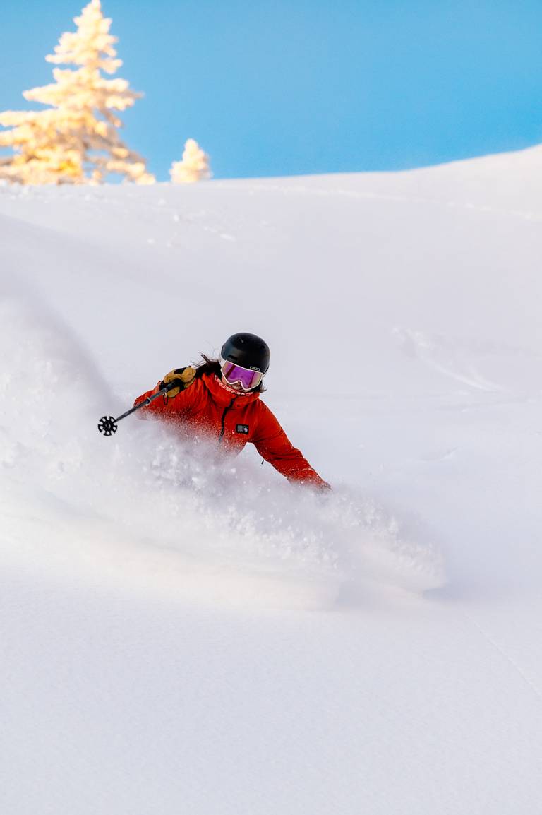 A skier at Sunday River in fresh powder.