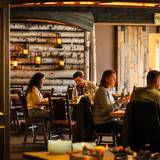 People dining at Camp at Sunday River.