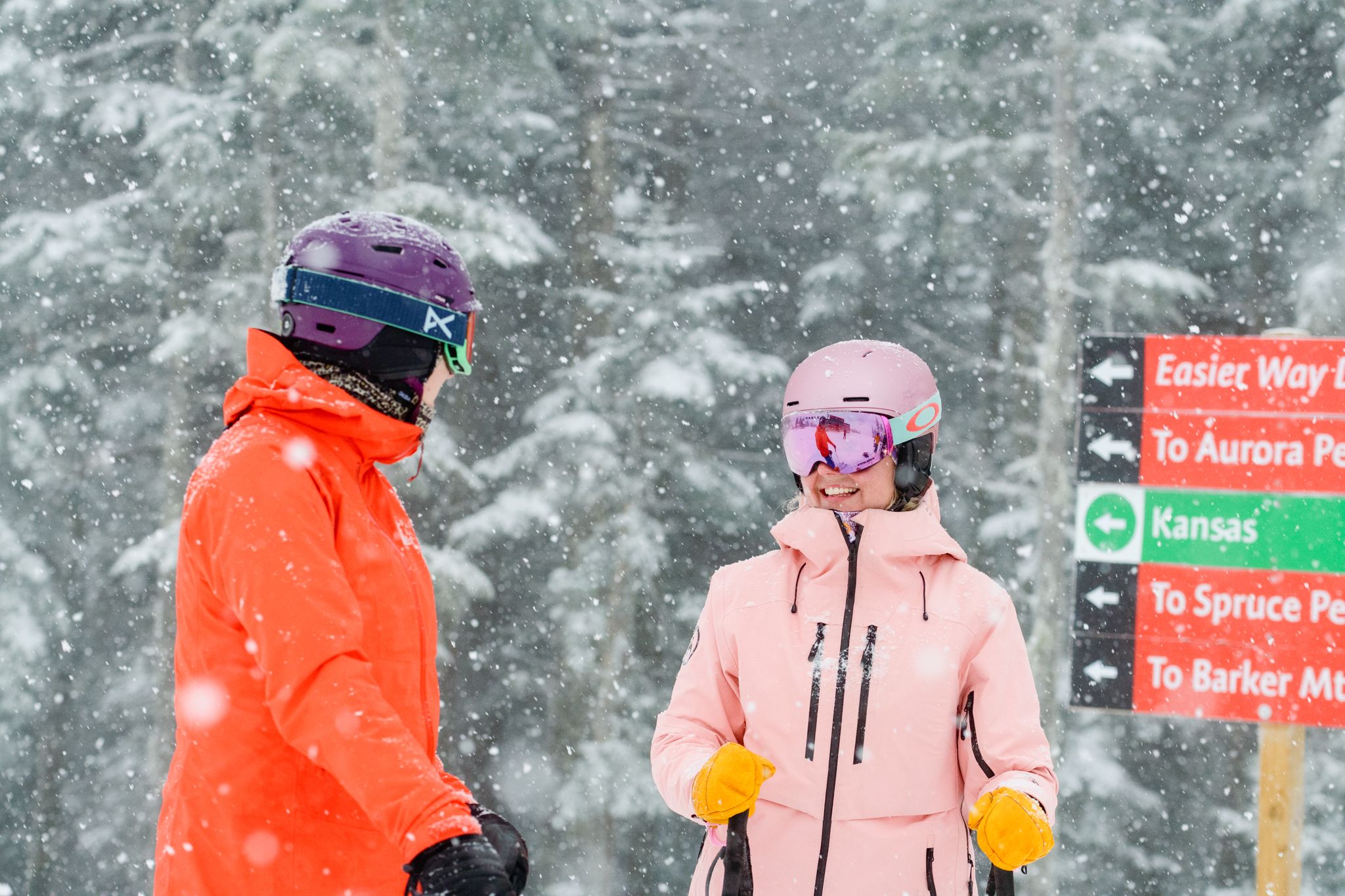 Two friends skiing together at Sunday River.