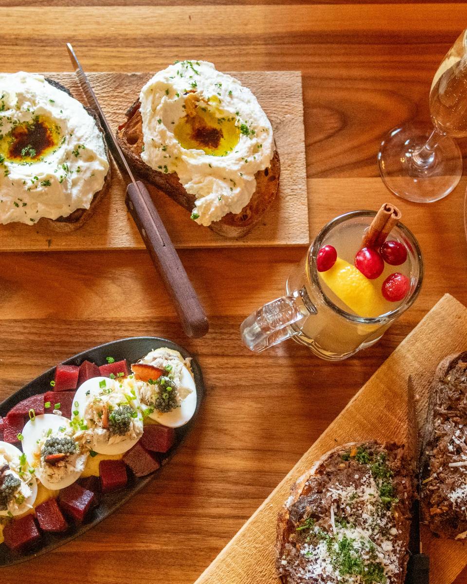 A spread of plated food from the Mountain Room at Sunday River.