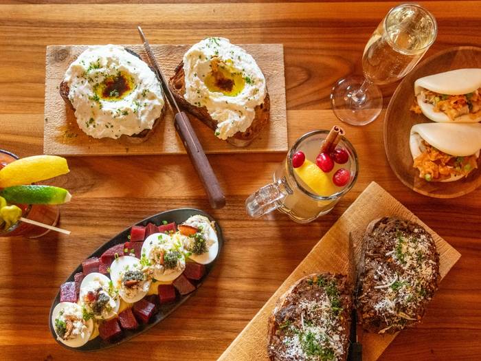 A spread of plated food from the Mountain Room at Sunday River.