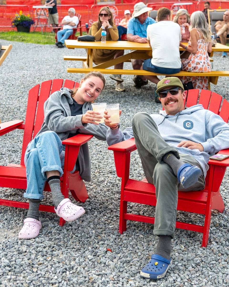 People cheering their glasses at Sunday River.