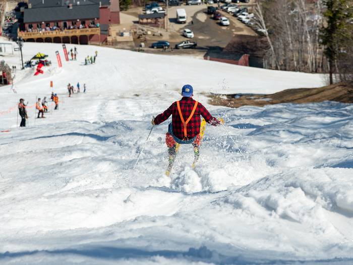 Donny Pelletier skiing moguls in the spring