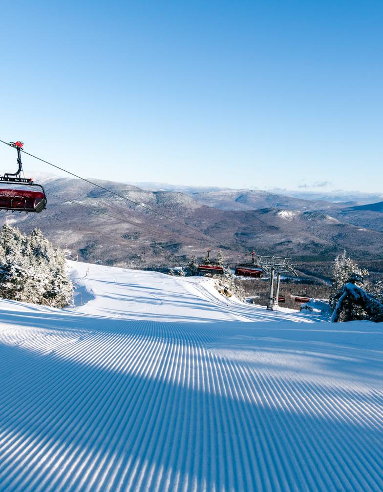The Jordan 8 lift at Sunday River over a freshly groomed trail