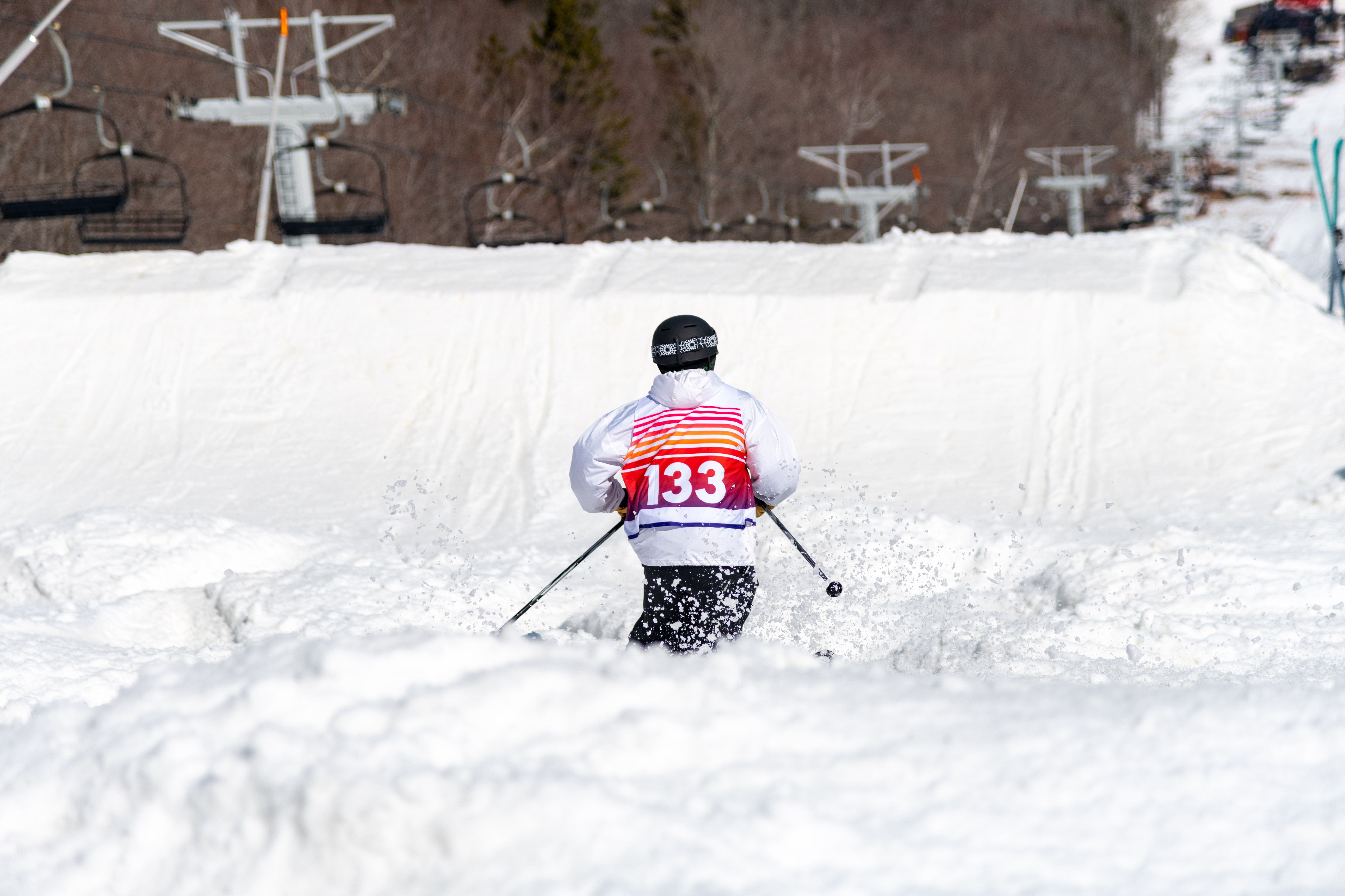 A person skiing bumps at Bust N Burn at Sunday River.