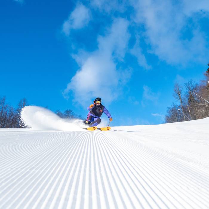 A woman skiing at Sunday River.