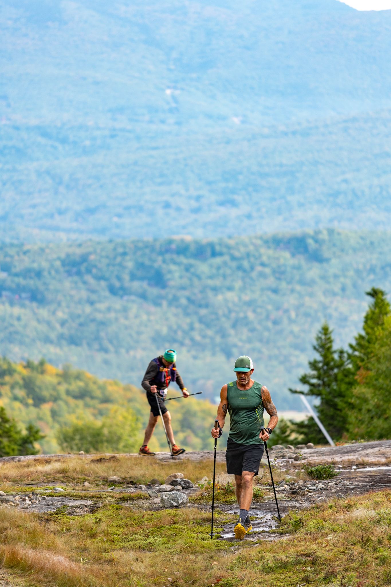 Hikers climbing up a trail at Sunday River.