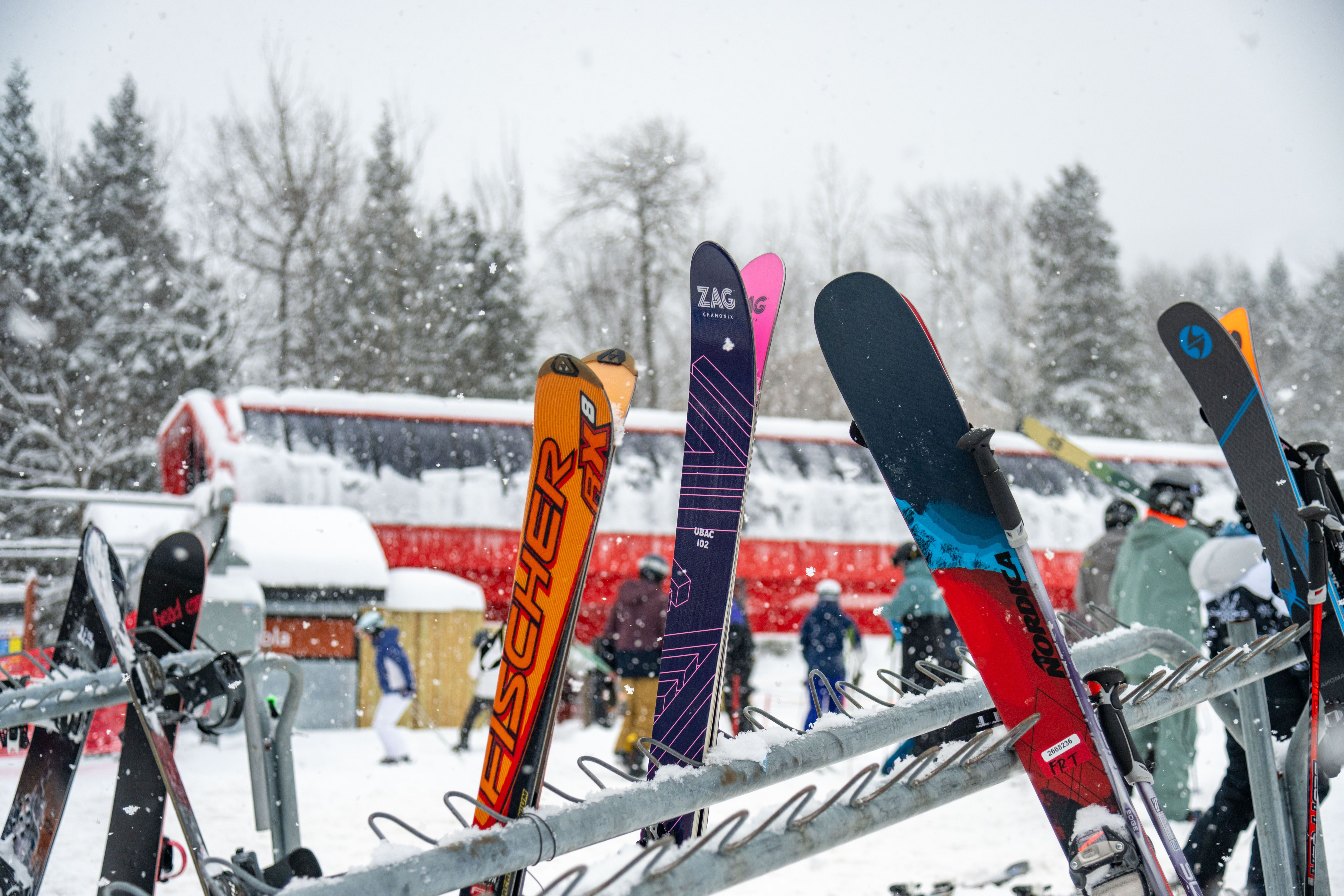 A woman skiing down a trail at Sunday River