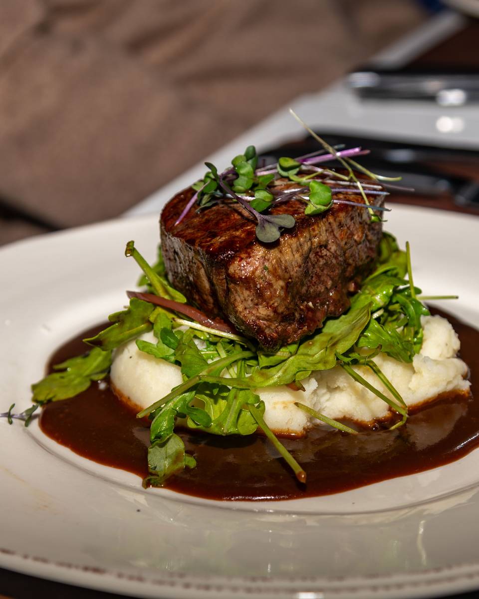A plate of steak and potatoes at Sunday River's Ember.