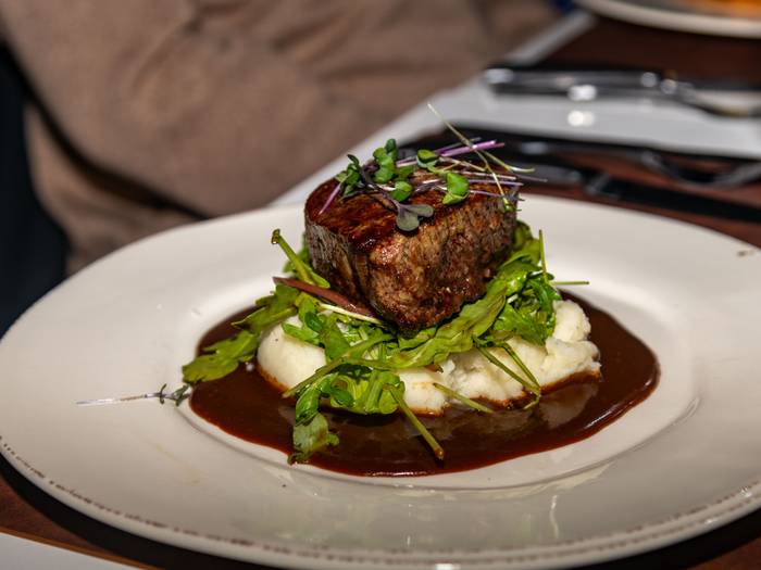 A plate of steak and potatoes at Sunday River's Ember.