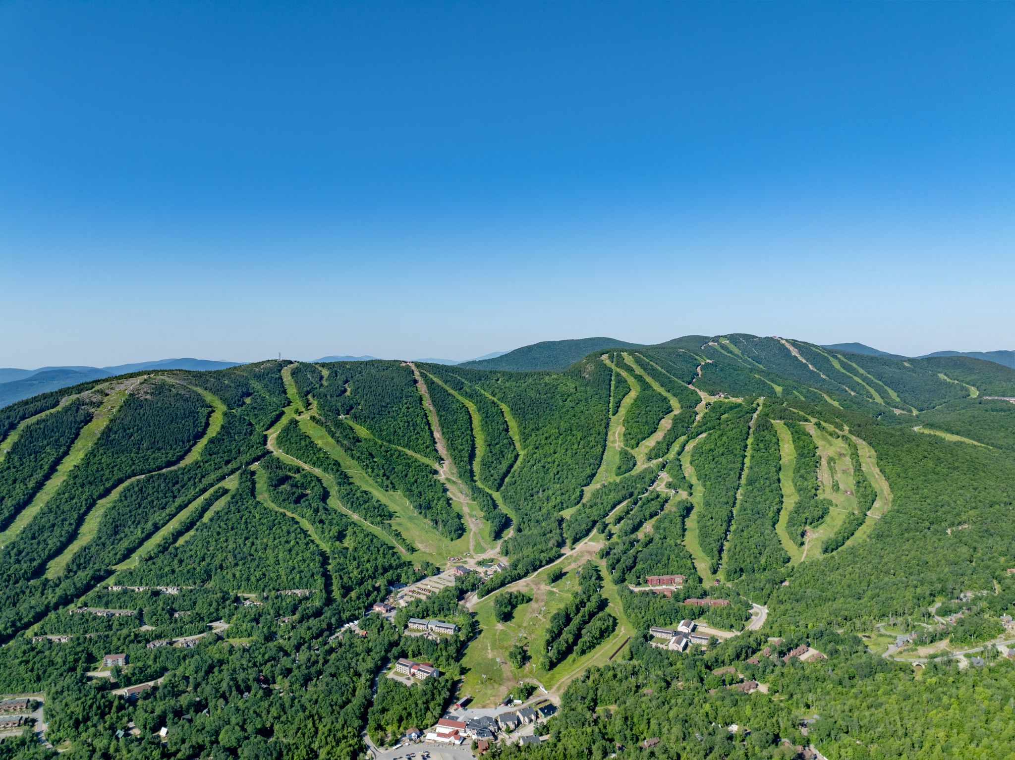 An aerial view of the 8 peaks at Sunday River in the summer.