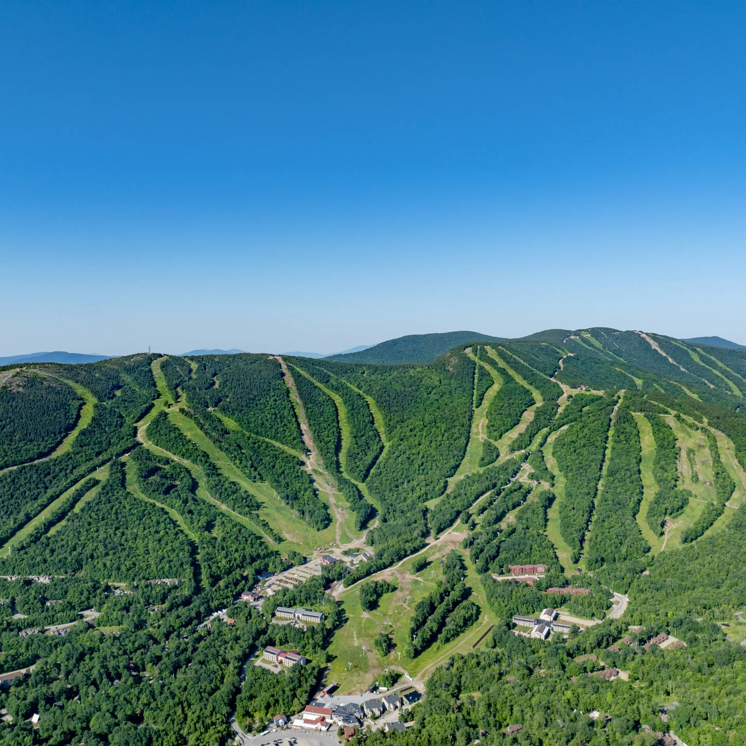 An aerial view of the 8 peaks at Sunday River in the summer.