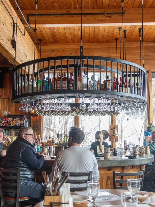 People sitting at the bar at the Mountain Room at Sunday River.