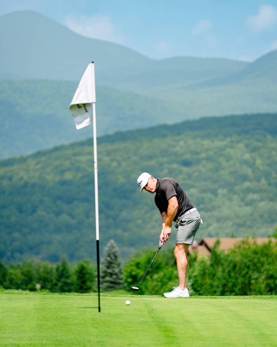 A person golfing.