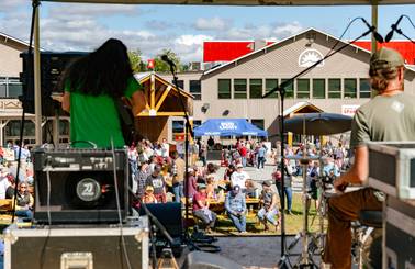 People listening to music at Sunday River's River Fest.