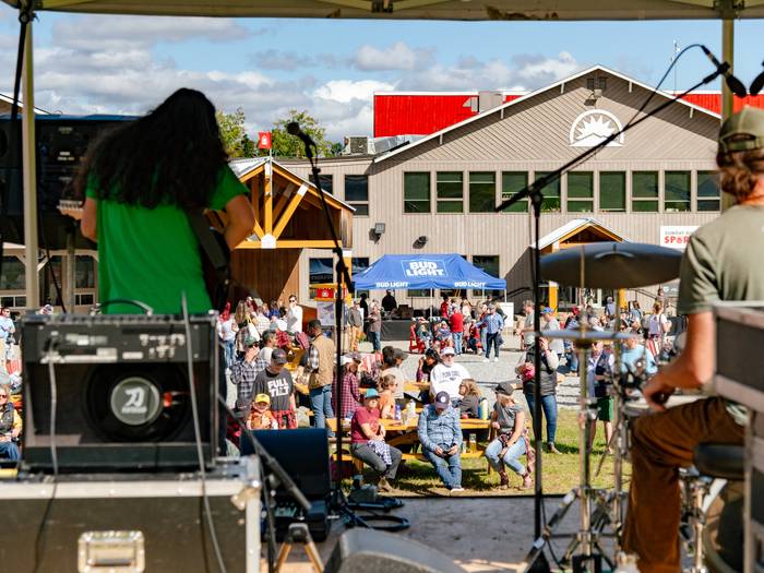 People enjoying music in the summer at Sunday River.