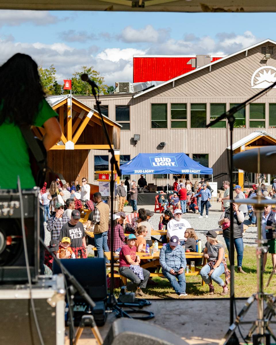 People enjoying music in the summer at Sunday River.
