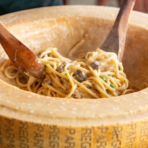 A wheel of cheese with pasta at Sunday River.