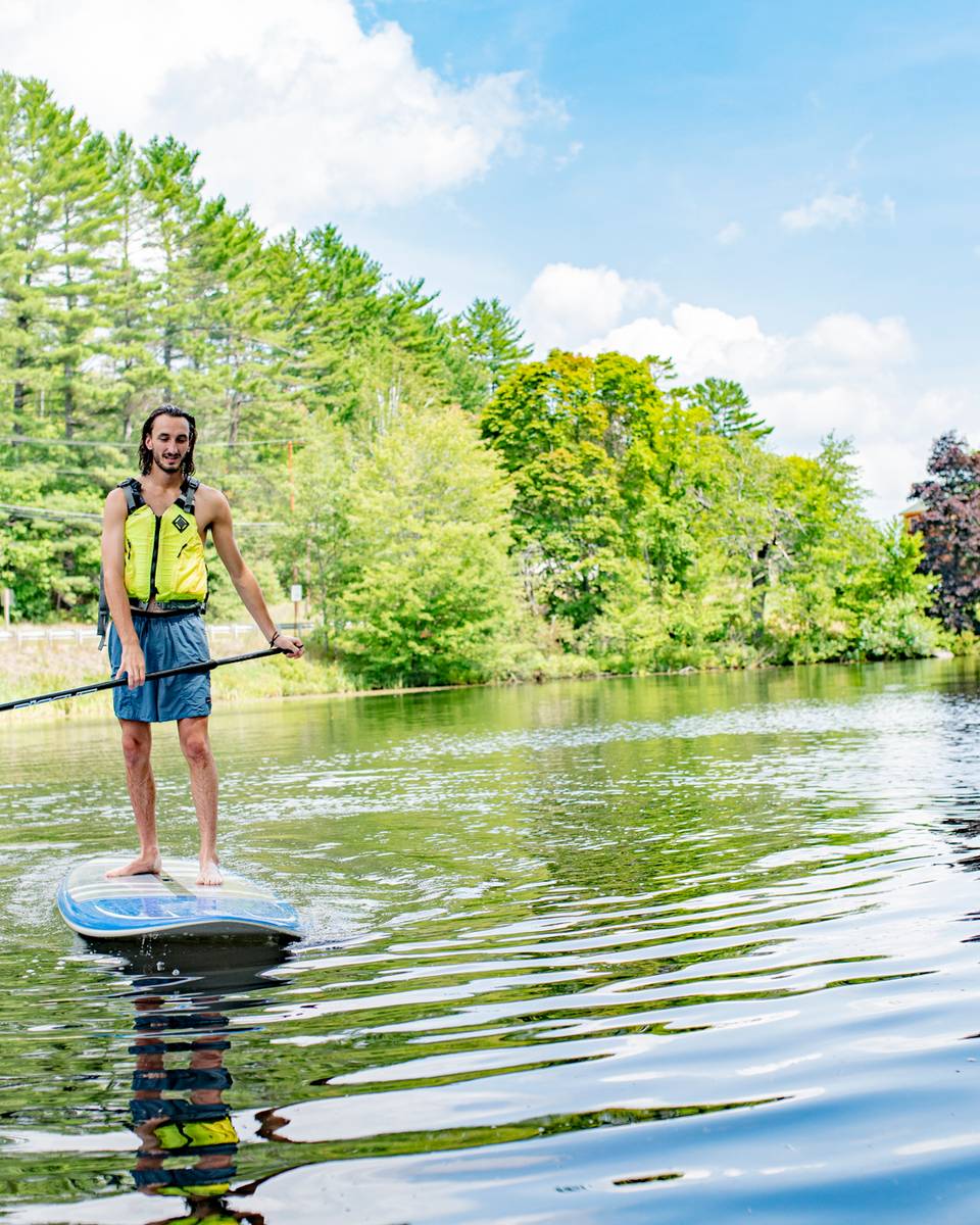 A person paddleboarding.