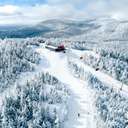 Barker 6 with fresh snow in the trees.